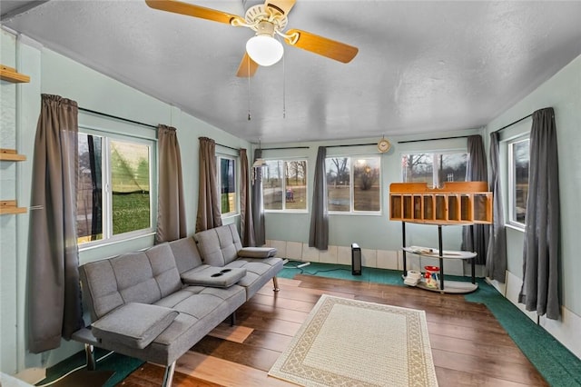 sunroom / solarium with ceiling fan