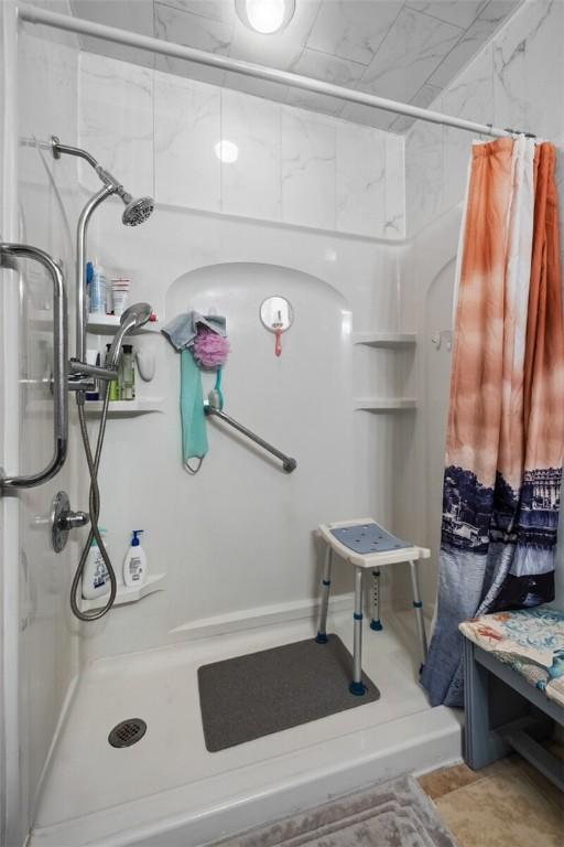 bathroom featuring walk in shower