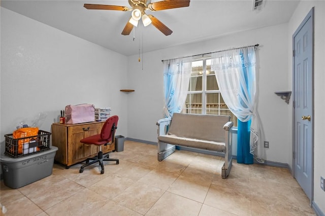 office with light tile patterned flooring and ceiling fan