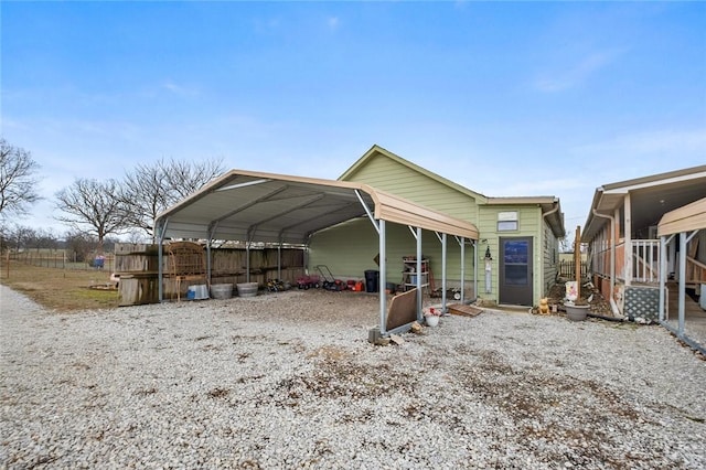 view of parking with a carport