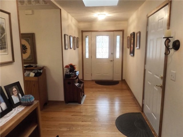 foyer with light hardwood / wood-style flooring