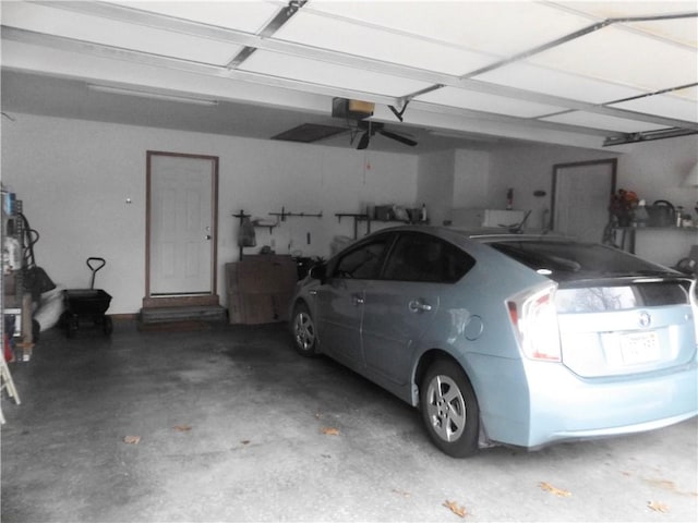 garage featuring a garage door opener