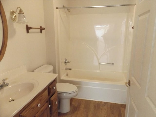 82 Baypoint Dr, Mountain Home, AR 72653 - full bath with shower / bathtub combination, vanity, toilet, and wood finished floors