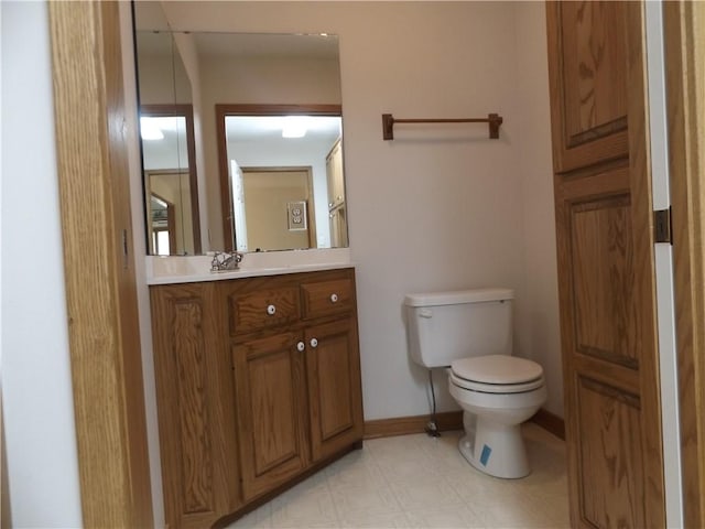 82 Baypoint Dr, Mountain Home, AR 72653 - bathroom with toilet, tile patterned floors, vanity, and baseboards