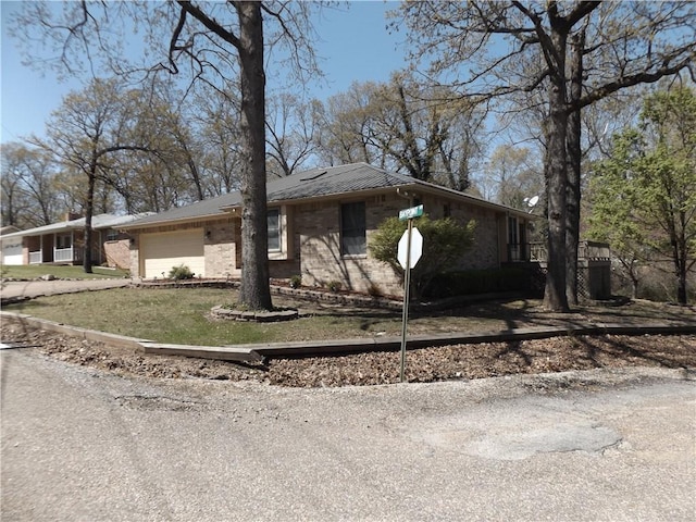 82 Baypoint Dr, Mountain Home, AR 72653 - view of front facade with a front lawn and an attached garage
