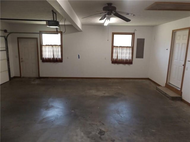 82 Baypoint Dr, Mountain Home, AR 72653 - garage with baseboards, a ceiling fan, a garage door opener, and electric panel