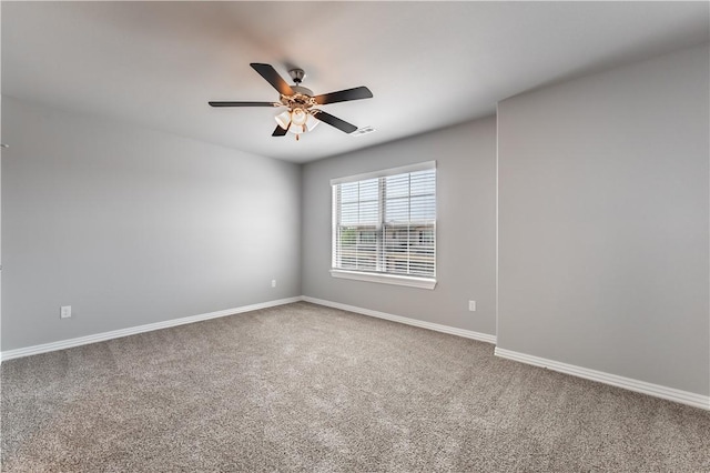 2643 S Kilimanjaro Way, Rogers, AR 72758 - carpeted spare room with ceiling fan and baseboards
