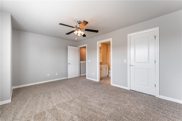 2643 S Kilimanjaro Way, Rogers, AR 72758 - unfurnished bedroom with light colored carpet, ensuite bathroom, and a ceiling fan