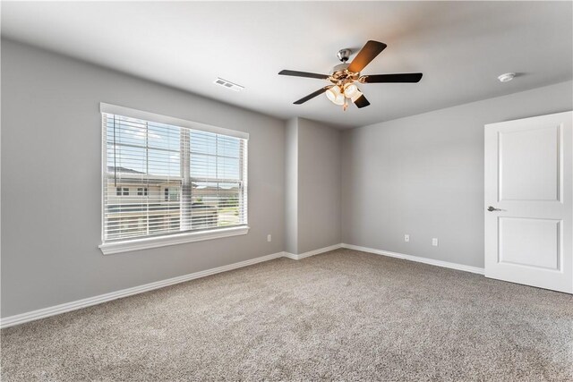 2643 S Kilimanjaro Way, Rogers, AR 72758 - carpeted spare room featuring ceiling fan and a smoke detector