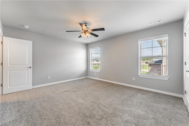 2643 S Kilimanjaro Way, Rogers, AR 72758 - carpeted empty room featuring ceiling fan and baseboards