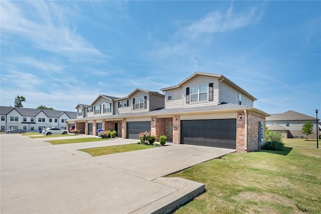 2643 S Kilimanjaro Way, Rogers, AR 72758 - view of front of home with a garage, brick siding, concrete driveway, a front yard, and a residential view