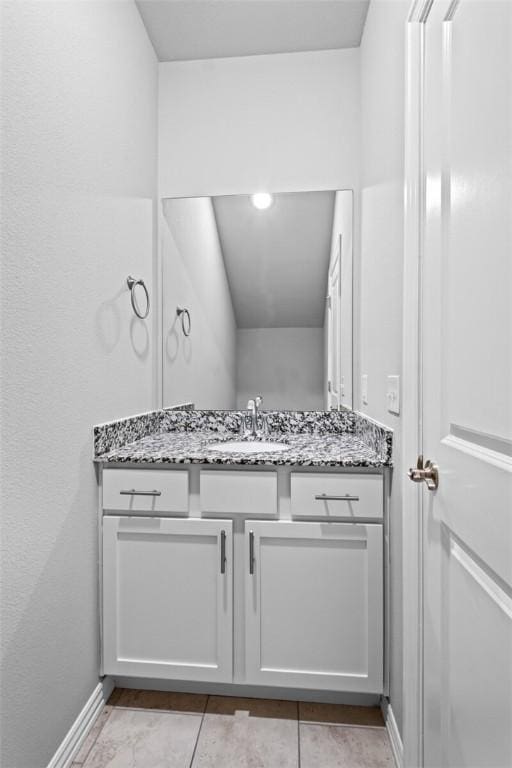 2643 S Kilimanjaro Way, Rogers, AR 72758 - bathroom featuring vanity and tile patterned flooring