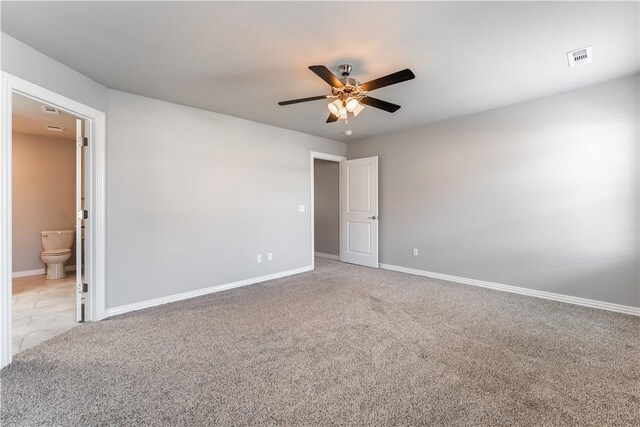 2643 S Kilimanjaro Way, Rogers, AR 72758 - empty room with ceiling fan and light carpet