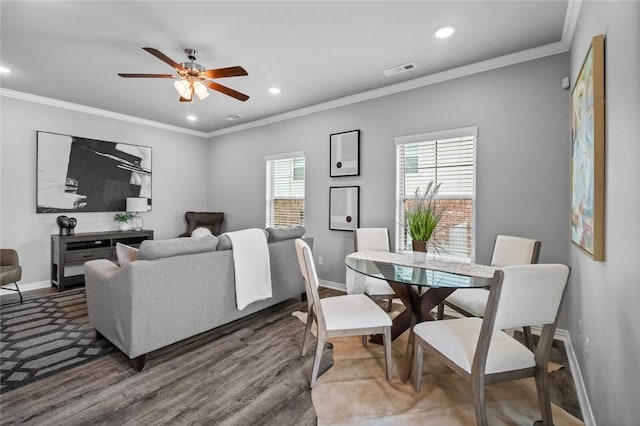 2643 S Kilimanjaro Way, Rogers, AR 72758 - dining space featuring wood finished floors, a ceiling fan, crown molding, and recessed lighting