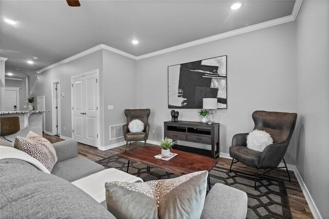 2643 S Kilimanjaro Way, Rogers, AR 72758 - living room with wood finished floors, crown molding, and recessed lighting