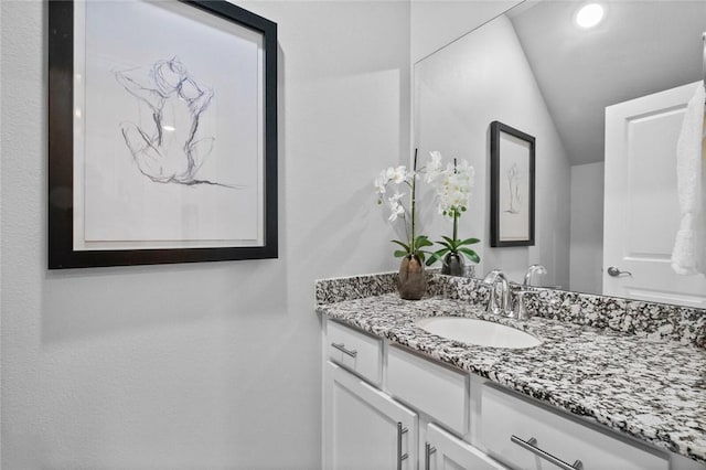 2643 S Kilimanjaro Way, Rogers, AR 72758 - bathroom featuring vanity and lofted ceiling