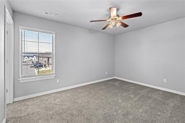 2649 W Everest Ave, Rogers, AR 72758 - empty room with carpet flooring and a ceiling fan