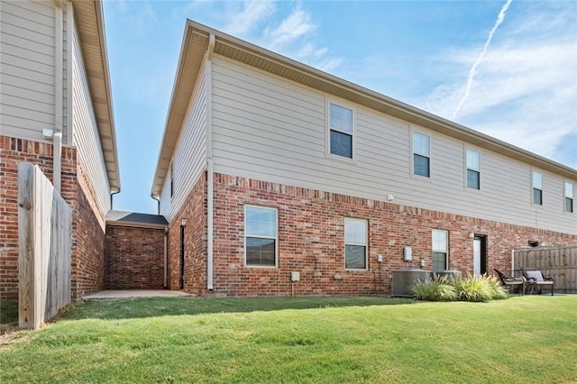 2649 W Everest Ave, Rogers, AR 72758 - rear view of property with brick siding