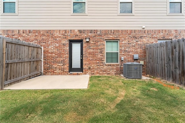 2682 W Kilimanjaro Way, Rogers, AR 72758 - property entrance featuring a patio and brick siding