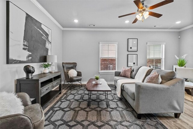 2682 W Kilimanjaro Way, Rogers, AR 72758 - living room featuring wood finished floors, ceiling fan, recessed lighting, and ornamental molding