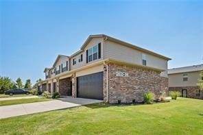 view of home's exterior with a garage and a lawn