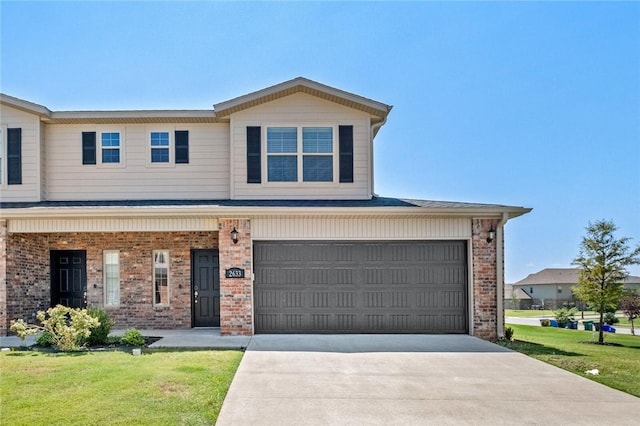 view of front of house featuring a garage and a front yard