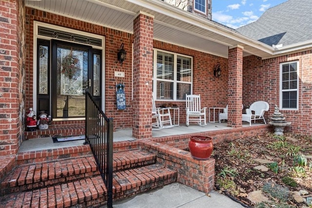 property entrance with covered porch