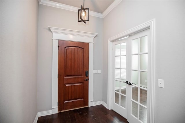 entryway featuring ornamental molding, dark wood-type flooring, and french doors