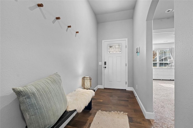 entrance foyer featuring dark hardwood / wood-style floors