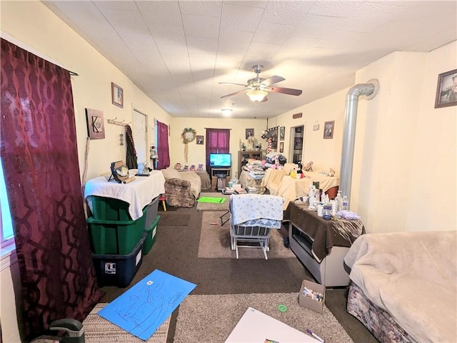 living room with ceiling fan