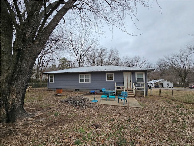 rear view of property with a patio