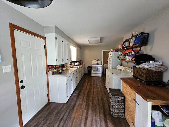 708 N Oak St, Harrison, AR 72601 - clothes washing area with dark wood-style flooring and washing machine and clothes dryer