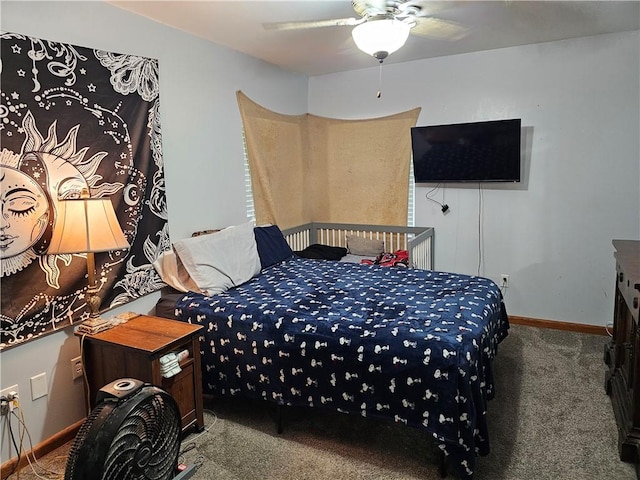 708 N Oak St, Harrison, AR 72601 - carpeted bedroom with baseboards and a ceiling fan