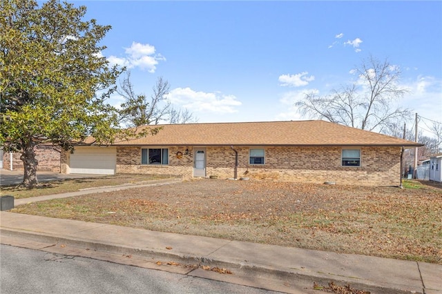 single story home featuring a garage