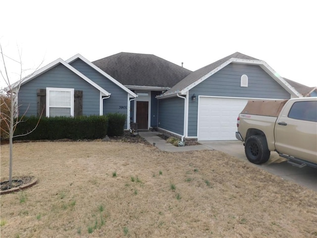 ranch-style home with a garage