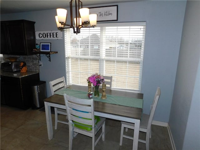 dining room featuring an inviting chandelier