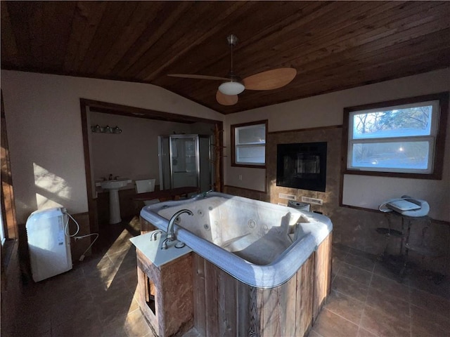 view of patio / terrace featuring ceiling fan