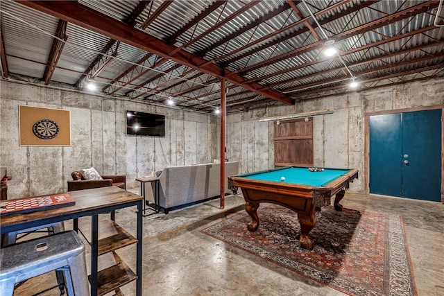 recreation room featuring concrete floors, billiards, and metal wall