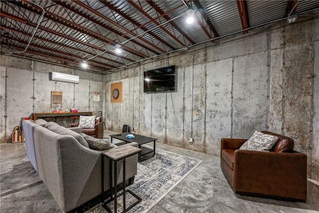 living room with unfinished concrete flooring, a wall mounted AC, and metal wall