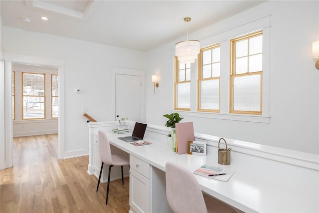 home office featuring light wood-type flooring, baseboards, built in desk, and recessed lighting