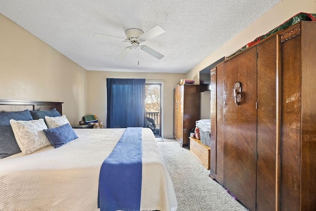 bedroom with a textured ceiling, ceiling fan, access to outside, and light colored carpet