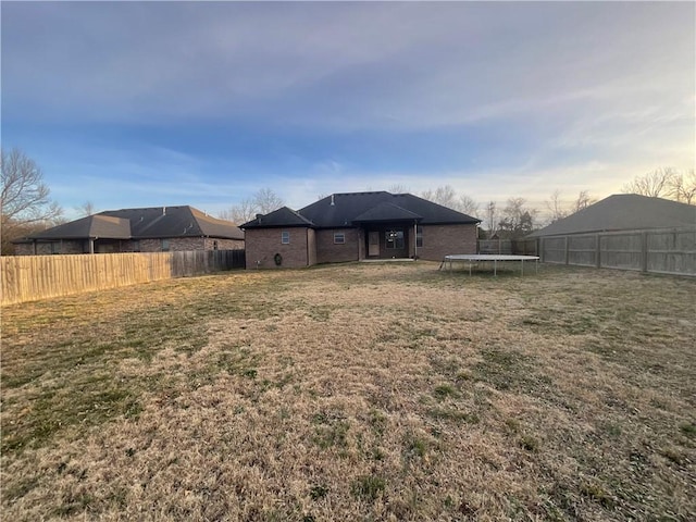 view of yard with a trampoline