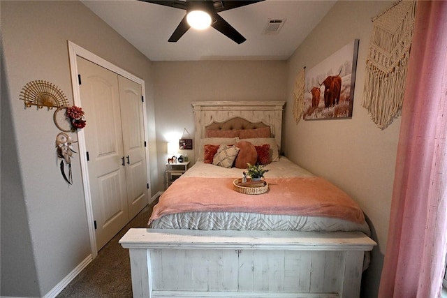 carpeted bedroom with a closet and ceiling fan