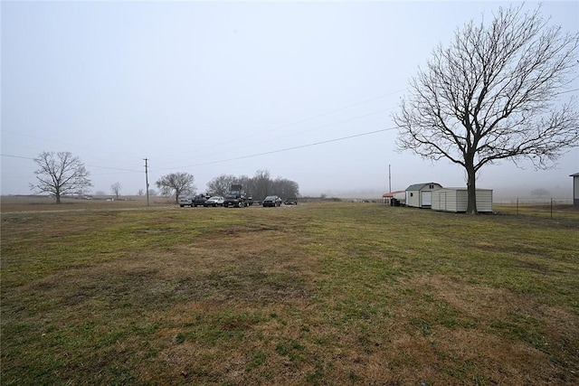 view of yard featuring a rural view