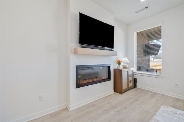 living room with light wood-type flooring