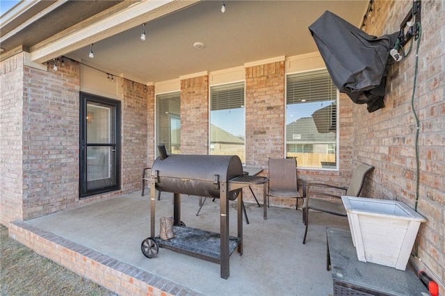 view of patio with a grill