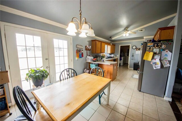 9998 Farm Rd Unit 2240, Washburn, MO 65772 - dining room featuring light tile patterned floors, visible vents, crown molding, and ceiling fan with notable chandelier