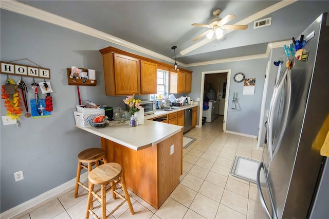 9998 Farm Rd Unit 2240, Washburn, MO 65772 - kitchen featuring ornamental molding, a ceiling fan, stainless steel appliances, a peninsula, and brown cabinetry
