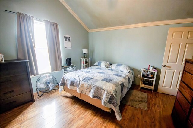 9998 Farm Rd Unit 2240, Washburn, MO 65772 - bedroom with multiple windows, ornamental molding, lofted ceiling, and wood finished floors