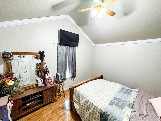 9998 Farm Rd Unit 2240, Washburn, MO 65772 - bedroom with crown molding, ceiling fan, baseboards, lofted ceiling, and wood finished floors
